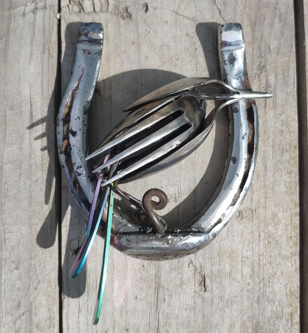 Silverware & horse shoe bird